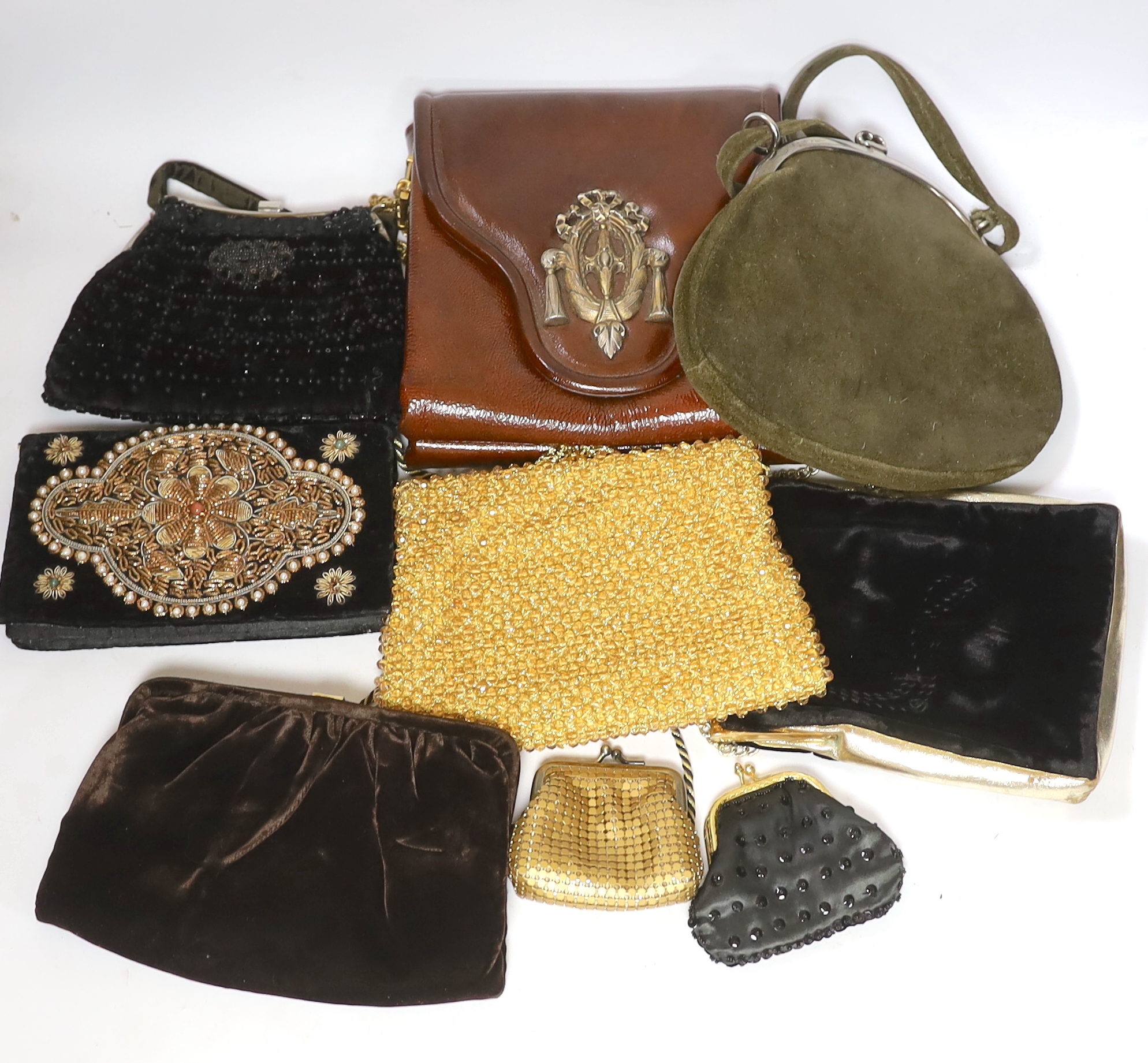 A Tseklenis ladies handbag, a green suede bag, five various evening bags and two purses